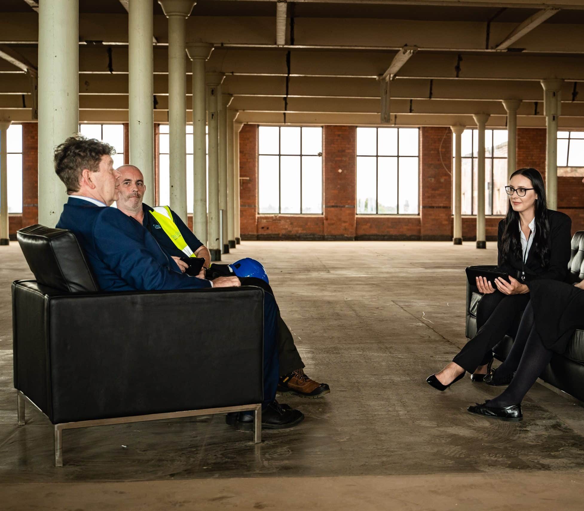 Four people from CityGroup having discussion